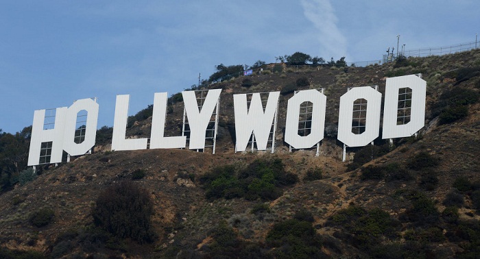 Man responsible for altering Hollywood sign surrenders to Los Angeles police 